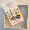 University of Nebraska at Kearney Classic Gameday Earring Stack with golden yellow mini enamel bolts and navy baby stars