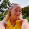 Wearing the Notre Dame Spirit Earring Stack for Fighting Irish game day