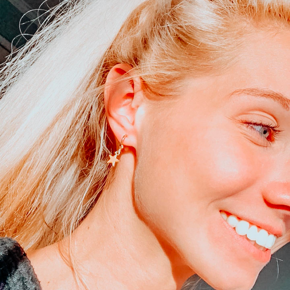 Abby Gendell Wearing Stacked By Suzie Baby Star Huggie Hoop Earrings Abby Gendell Wearing Stacked By Suzie Baby Star Huggie Hoop Earrings