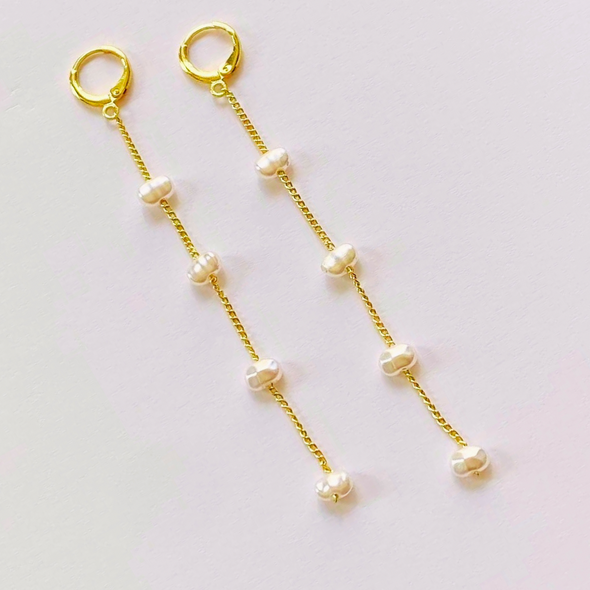 Pearl drop earrings with Huggie hoops in gold