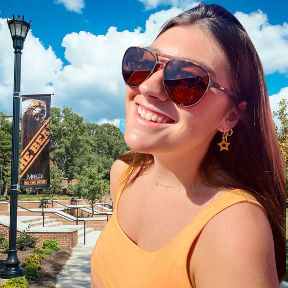 Wearing the Mercer Spirit Earring Stack for Bears game day