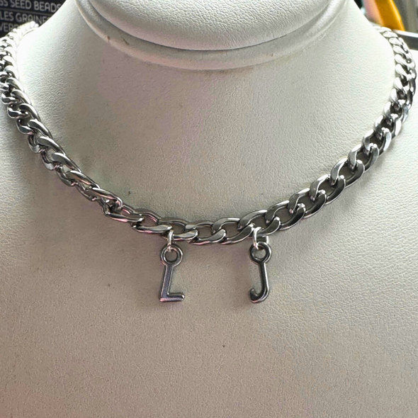 silver chain with mini upper  case initials/letters