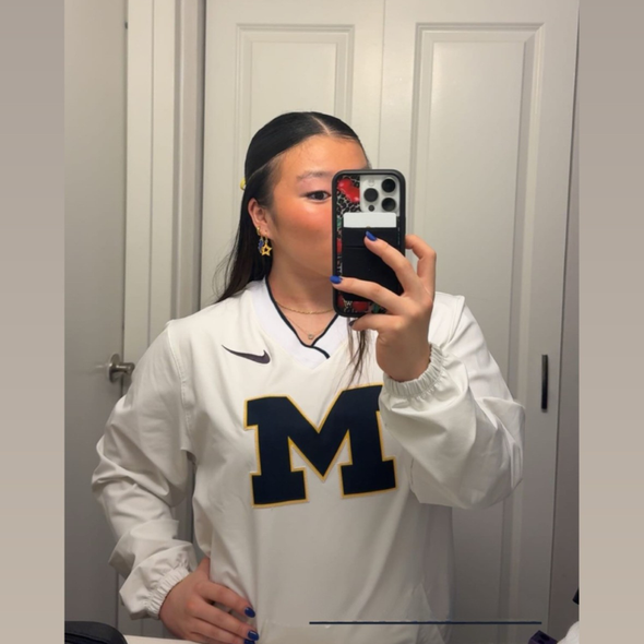 Wearing the Michigan Spirit Earring Stack for Wolverines game day