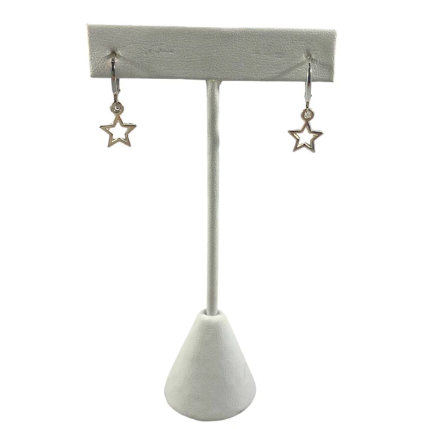 Silver open star huggie hoop earrings on display stand