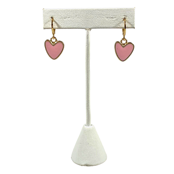 Statement Heart Huggie Hoop Earrings in  Pink Background Removed