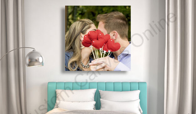 Square canvas picture displayed on the wall in a cozy bedroom