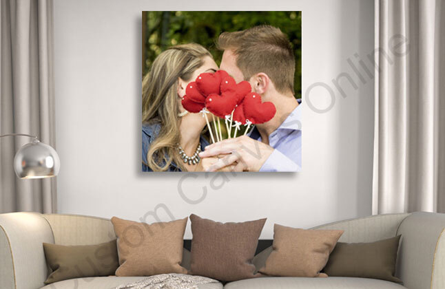 Square canvas print hanging above the sofa in a modern living room