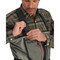 Model clipping a stretch elastic suspender buckle on Simms Freestone Z Stockingfoot Chest Waders