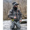 Fly fishing angler wading in stream wearing Simms Freestone Z Stockingfoot Chest Waders
