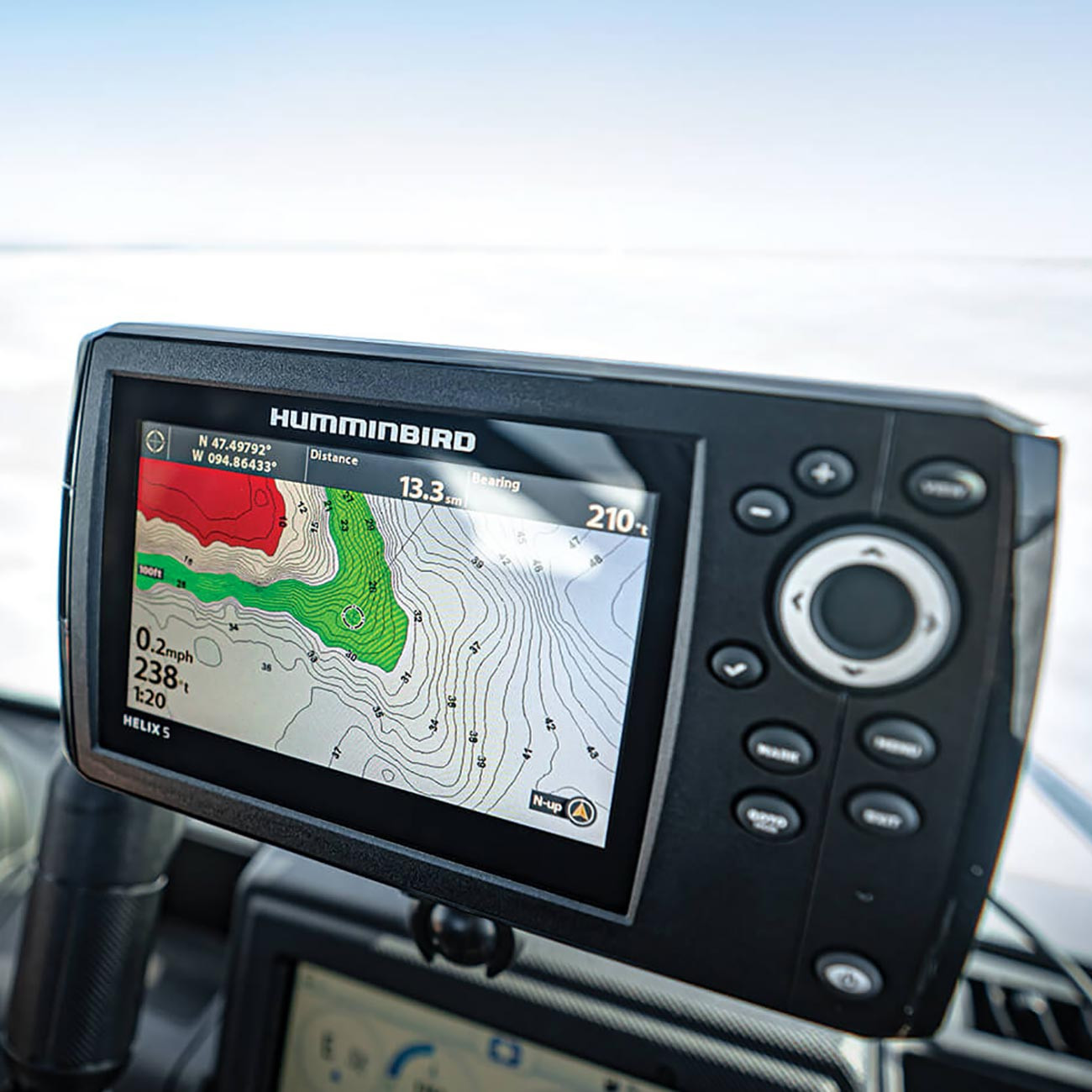 Humminbird Ice Helix 5 Chirp Sonar / GPS G3 Combo Fish Finder showing screen detail while being used on a boat