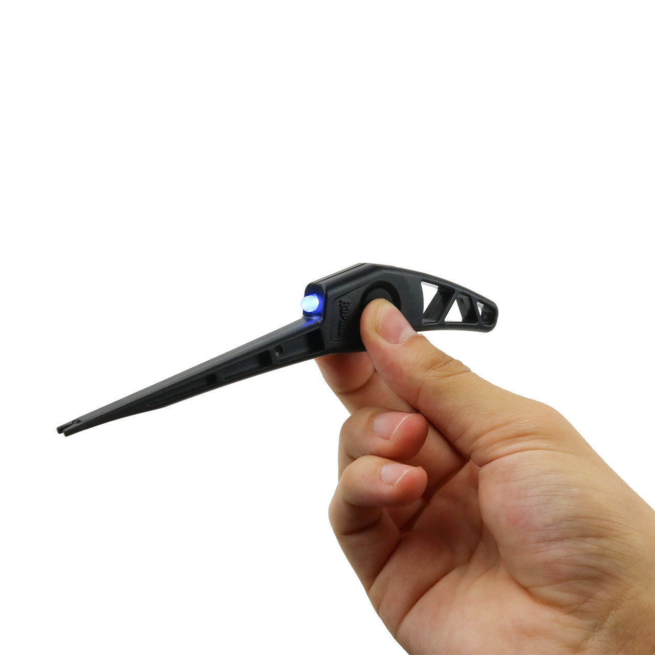 Rapala Glow Pick 6 in between thumb and forefinger demonstrating LED UV Pinch Light and tool size