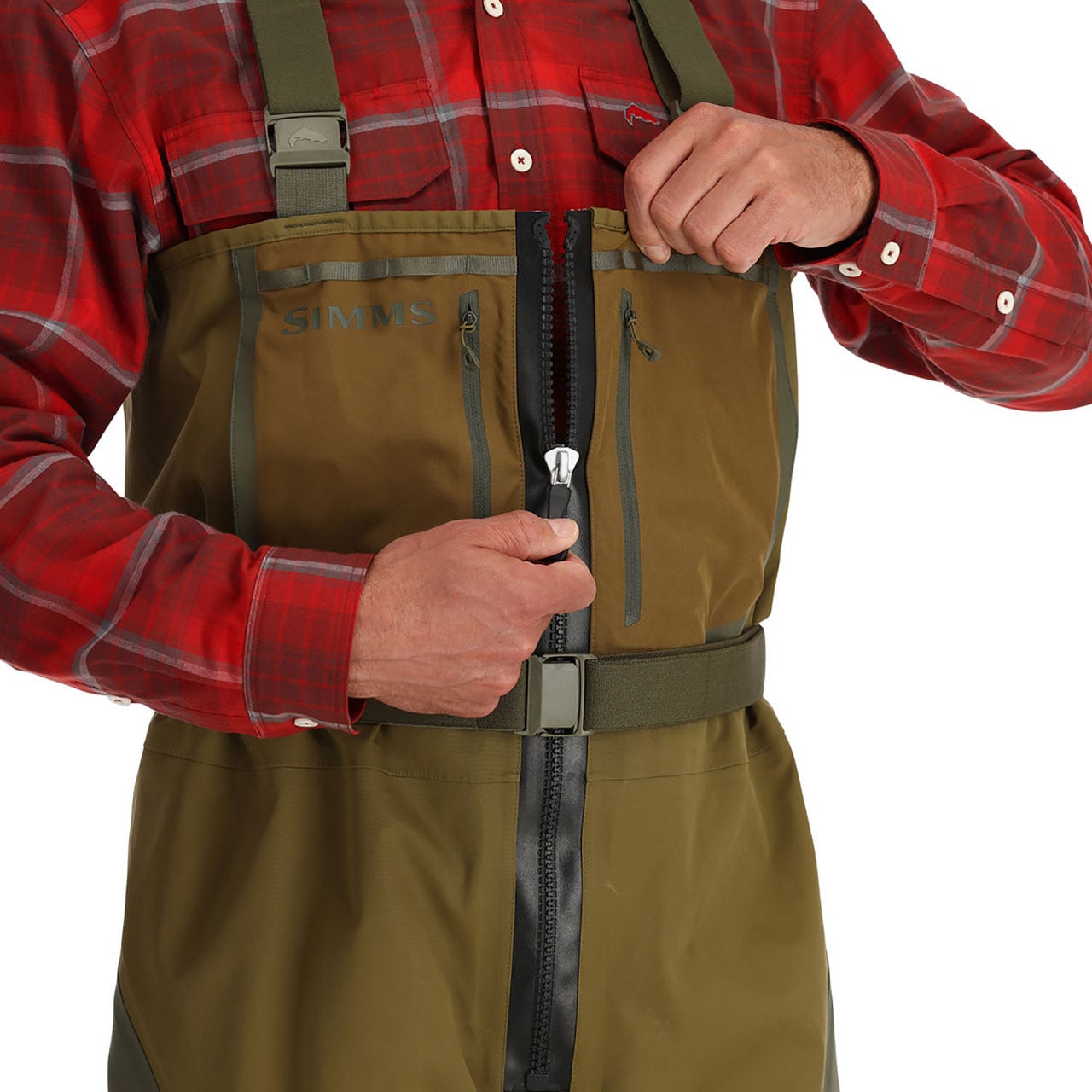 Simms Freestone Z Bootfoot Chest Waders model operating the TIZIP waterproof center front zipper