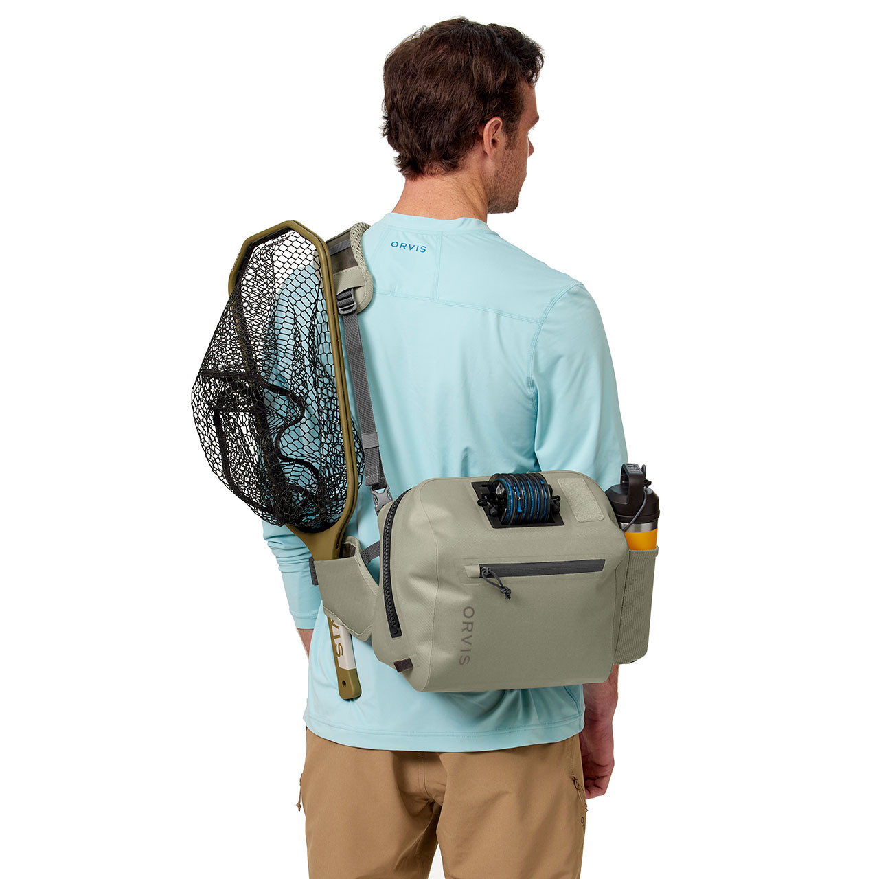 Orvis PRO Waterproof Hip Pack back view worn on hip of model (fishing accessories not included)