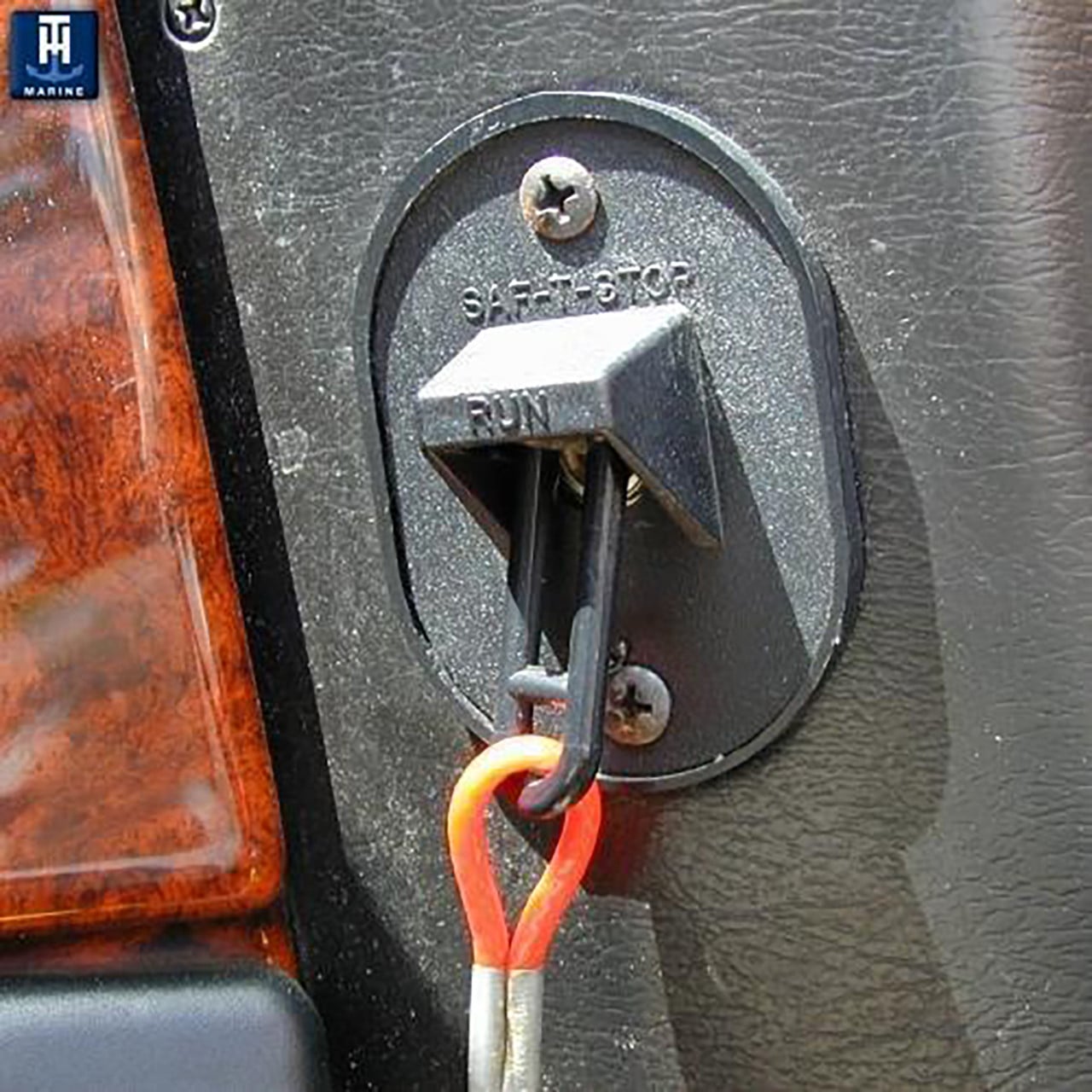 Close up of an installed T-H Marine Single Outboard Saf-T-Stop Kill Switch