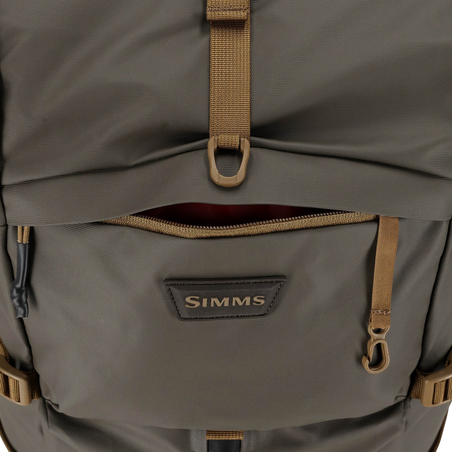 Simms Headwaters Backpack up close of top pocket and rolled down closure