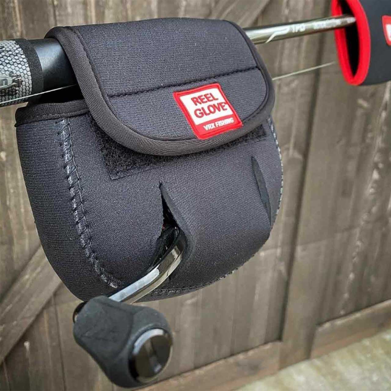 The Rod Glove Reel Glove for Spinning Reel in use on reel, reel and rod not included
