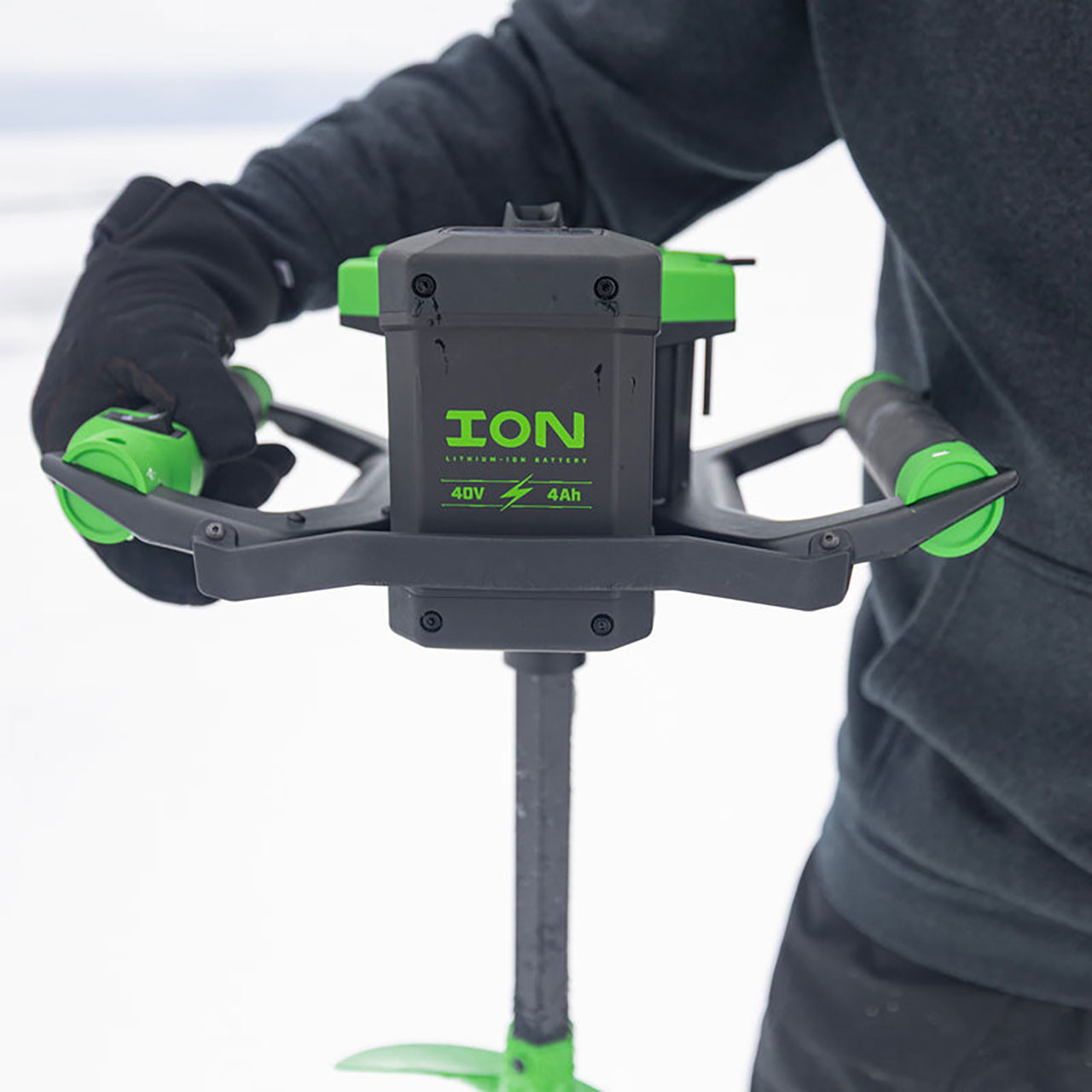 ION Alpha Pro Composite Ice Auger in use, close up of battery