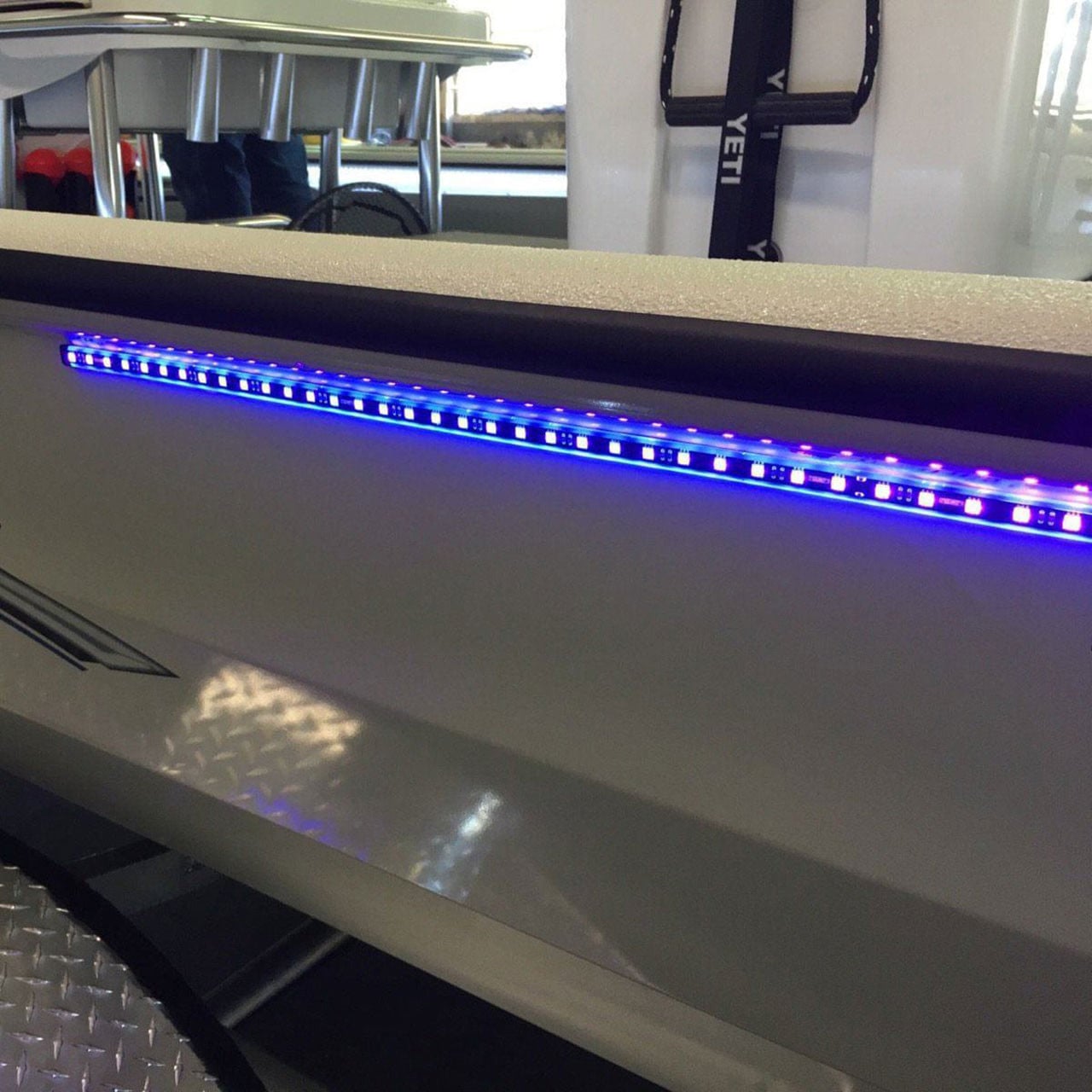 T-H Marine BlueWaterLED High Output UV Light Kit in use on the side of the boat