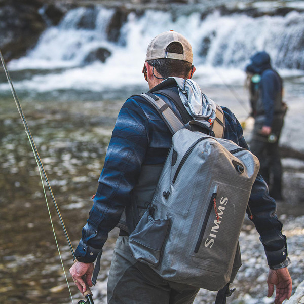 Simms Dry Creek Z Backpack in use on model