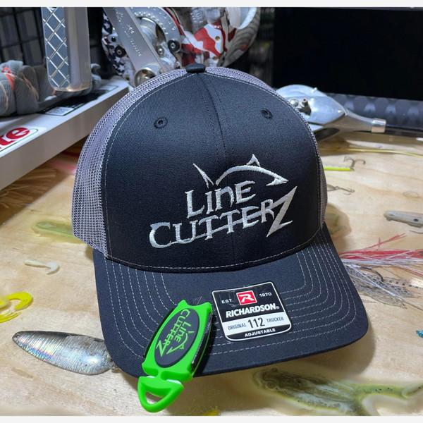 Line Cutterz Dual Hybrid Micro Scissors attached on a hat