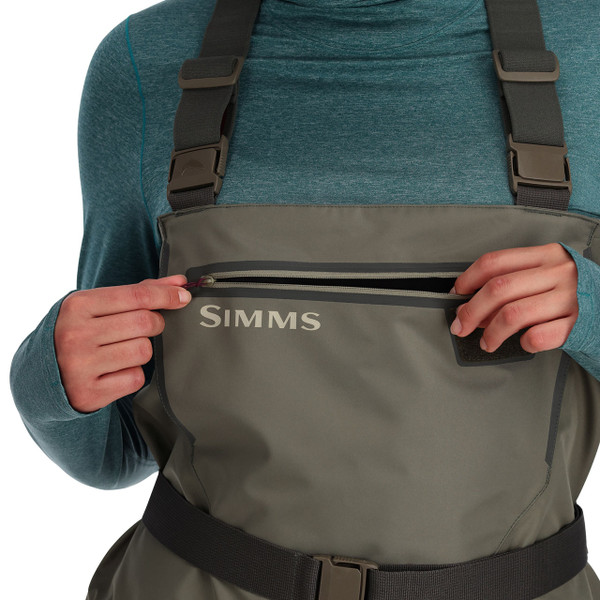 Simms Women's Tributary Stockingfoot Chest Waders close up of zippered top stash pocket in Basalt color