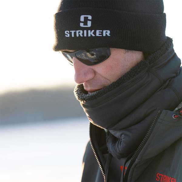 Striker Ice Tech Gaiter around an ice angler's neck and pulled up over his mouth