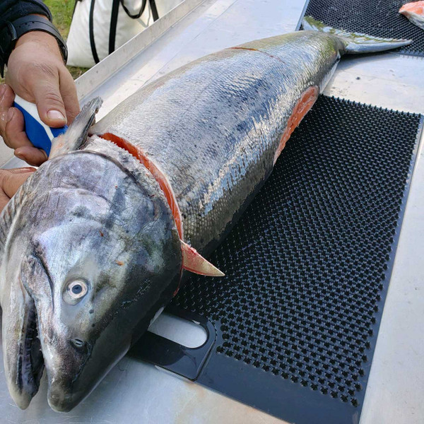 Fillet Away Fish Mat color Black with fish being filleted