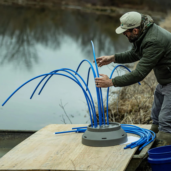 Cuda Whacky Bush Fish Attractor Kit in the process of being assembled