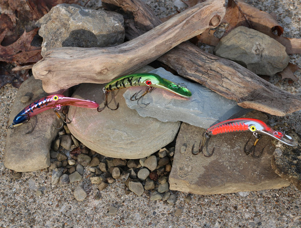 Yakima Bait Mag Lip colors Metallic Silver Red Herringbone (NFL), Misty River, Metallic Perch on rocks and sticks