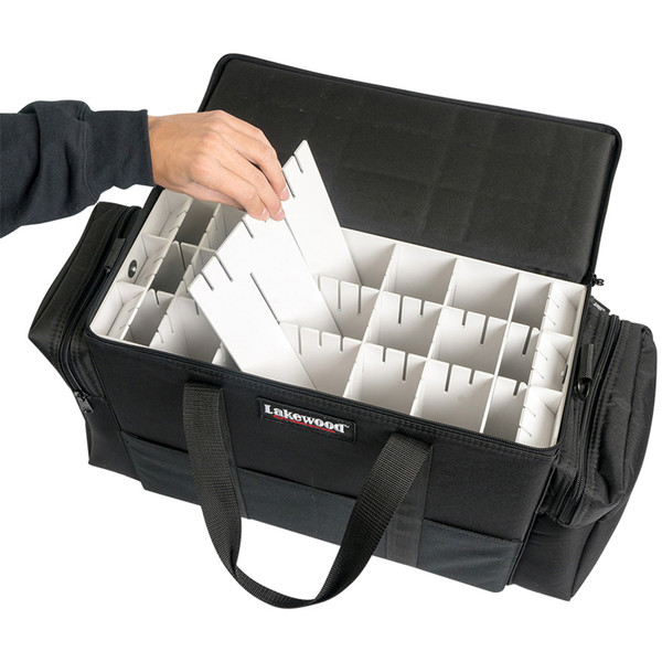 Lakewood Upright Soft-Sided Hard Tackle Box inside case view of a hand withdrawing an empty white hanging lure divider