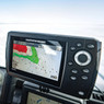 Humminbird Ice Helix 5 Chirp Sonar / GPS G3 Combo Fish Finder showing screen detail while being used on a boat