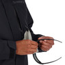 Simms Men's Challenger Fishing Jacket model using the chest pocket interior sunglasses chamois