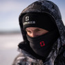 Close up of a Striker Ice Tech Gaiter pulled across the bridge of an angler's nose