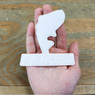 FishUSA Window Decal in palm of hand over wood table for color and size visual