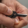 Smith's Fishing Line Clippers cutting knife in use