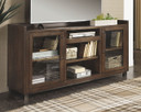 Starmore - Brown - Xl TV Stand W/Fireplace Option