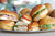 | Assortiment Red Star  : 1 belegde sandwich en 2 belegde pistolets per persoon. |
