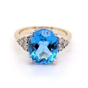 9ct Yellow Gold 5.70ct Blue Topaz & 0.11ct Diamond Cluster Ring murray co jewellers belfast