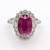 18ct White Gold 3.32ct Oval Ruby & 1.00ct Diamond Cluster Ring murray co jewellers belfast