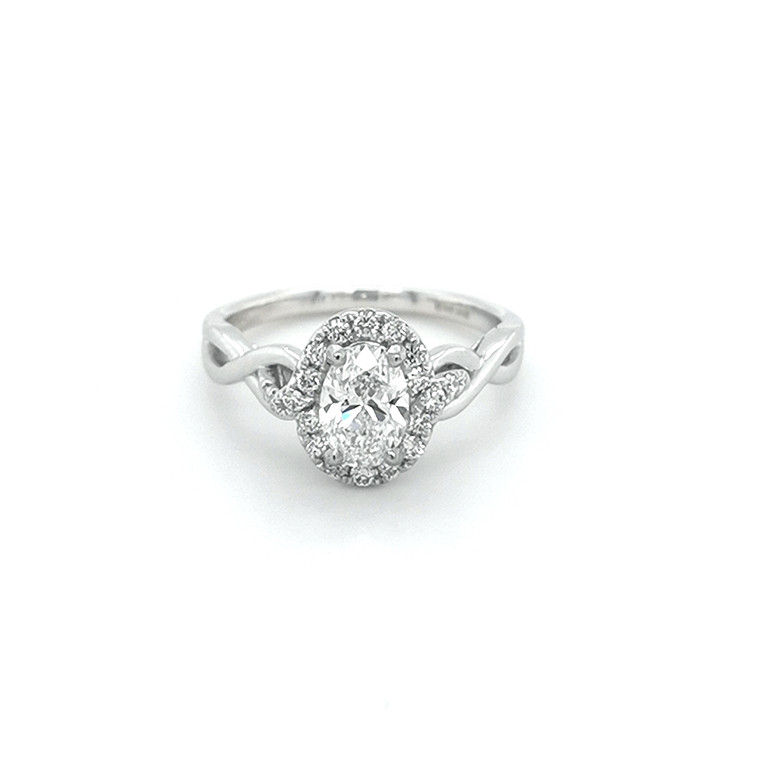 platinum 1.00ct oval diamond 0.11ct sapphire twist shank engagement ring murray jewellery belfast
