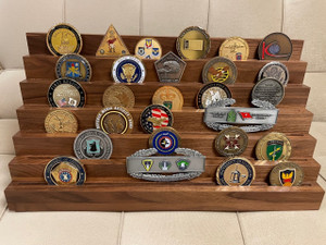 6 tiers genuine walnut challenge coin display stand.  Holds 7 each 2 inches coins per tier.  16 inches wide by 5-1/2 inches deep by 8 inches high.  Challenge coins are not included.