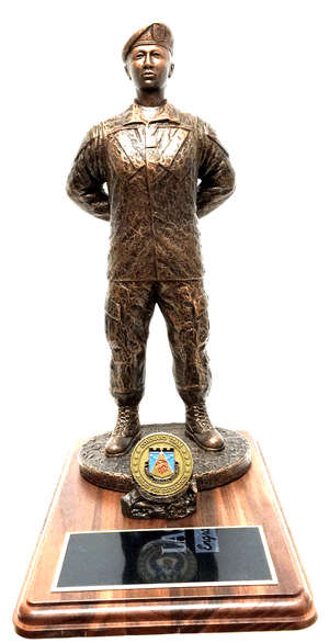 17" tall military female at parade rest military statue mounted on a 9" x 12" genuine walnut base with challenge coin holder.  Challenge coin not included: Army, Air Force, Navy or Marine medallion will be sent instead unless requested otherwise.