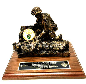 Combat medic military statue mounted on genuine walnut base 9 inches long by seven inches wide, with free engraving. Displayed coin is for sample only.