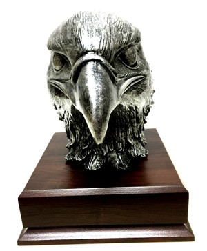 Eagle head silver tone, PCS or retirement gift idea, 8 inches total height mounted on a 6-1/2" wide by 6-1/2" long by 2-1/4" tall, laminated cherry base with free engraving.