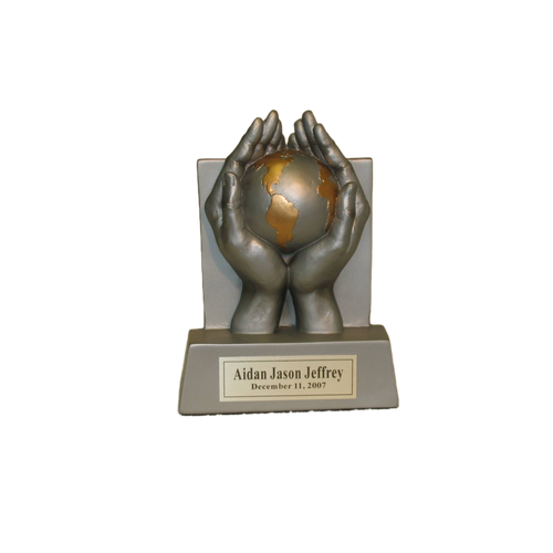 World of Thanks silver-tone resin award, standing at 6 inches tall.