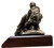 9" tall, 10" long, 7" wide male Soldier Medic military statue mounted on a 8" x 11" x 1-1/2" laminated cherry base.  "Calling Dustoff"  Also available on female version. Unit logo coin can be mounted on the small plate holder on the statue.