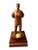 The military statue of a female warrior at parade rest, wearing a patrol cap, at a total height of 13.5 inches and is mounted on a laminated wood base 6.0 inches in width, 6.0 inches in length, and 2-1/4 inches in height. The army medallion can be replaced with one from another branch of service.