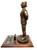 A military statue of a female warrior in patrol cap standing at parade rest, 17 inches tall, on a genuine walnut base of 9 by 12 inches with a holder for a challenge coin. No challenge coin is provided: a medallion of Army, Air Force, Navy or Marine will be included unless otherwise specified.