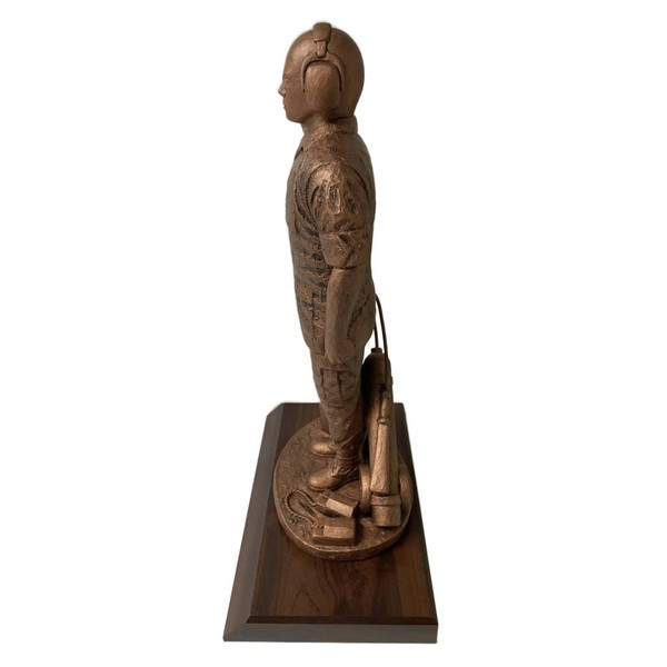 18 inches tall, Flight Line Maintainer male military statue, mounted on a 11 inches long by 7 inches wide by 1-1/2 inches high laminated cherry base, with free engraving.