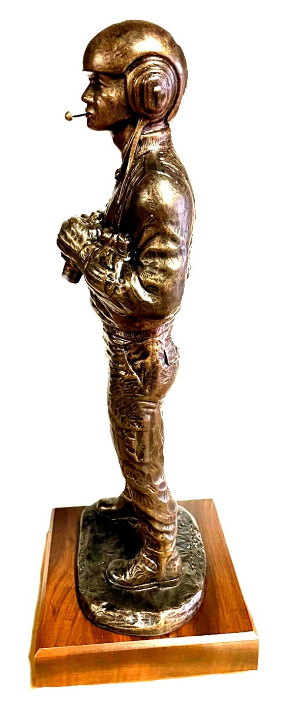 19" tall "the Tanker" military statue mounted on a 7"W x 7"D x 2"H laminated cherry base.